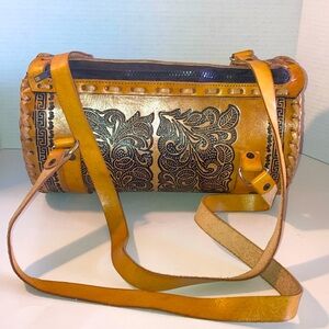 Handmade, leather tooled design duffel bag purse